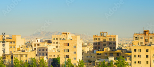 Tehran cityscape at sunset,...