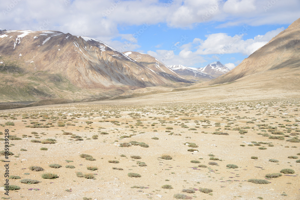 Long distance cycling in the Wakhan valley, Pamir Mountain Range, Tajikistan