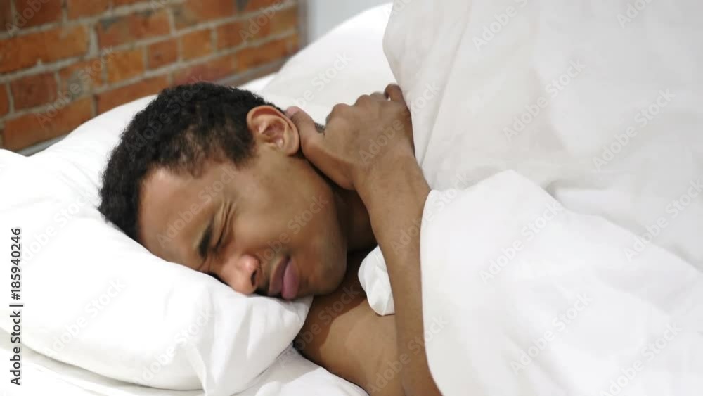 Tired African Man at Work Trying to Relax Tired African Man at Work Trying to Relax