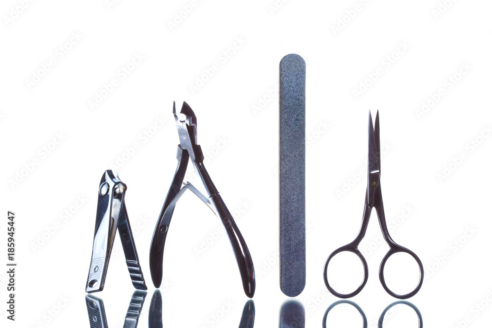 Nail kit with tools on white background. Nail kit with tools on white background.