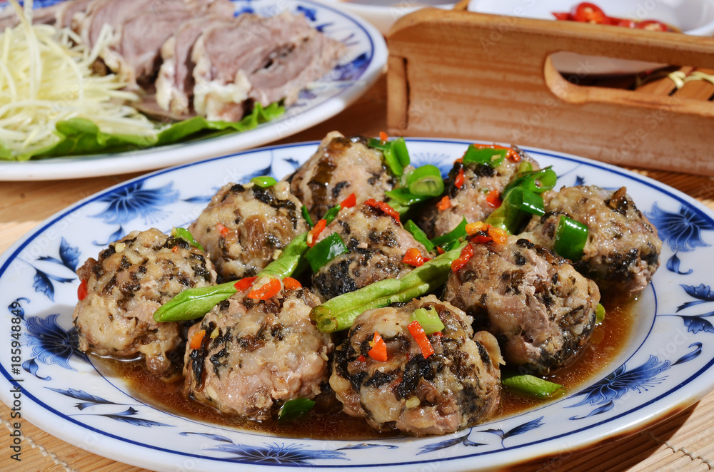 Stewed pork ball with preserved mustard in brown sauce, Taiwan style.