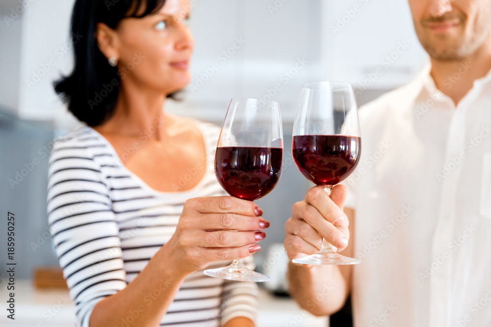 Portrait of a couple having a glass of red wine Portrait of a couple having a glass of red wine