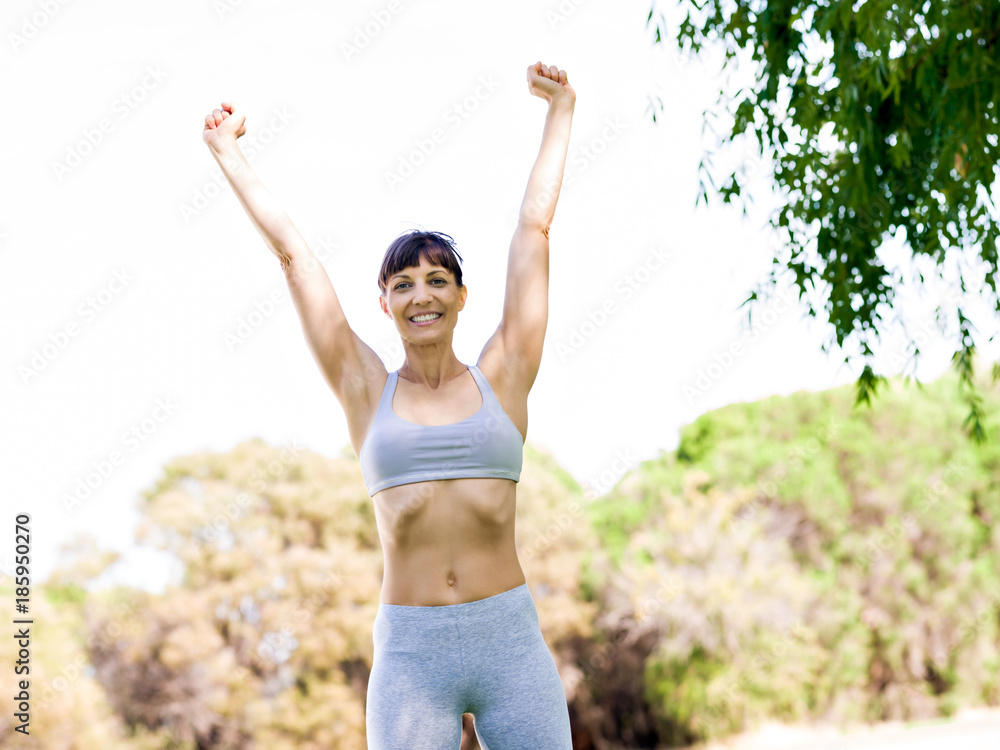 Young woman exercising in the park Young woman exercising in the park