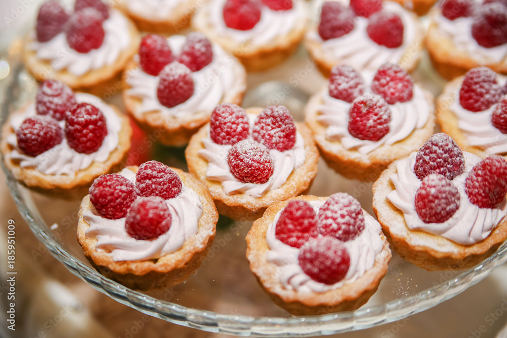 Raspberry cupcake desserts with pink cream
Raspberry cupcake desserts with pink cream
