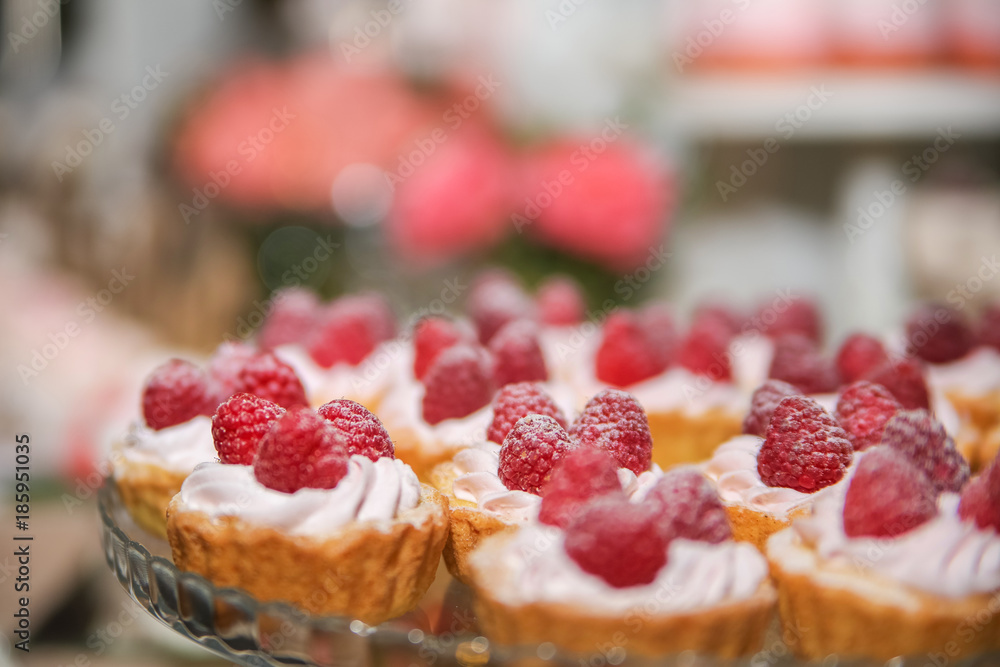 Raspberry cupcake desserts with pink cream
Raspberry cupcake desserts with pink cream