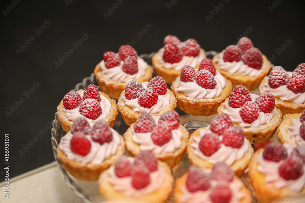 Raspberry cupcake desserts with pink cream
Raspberry cupcake desserts with pink cream