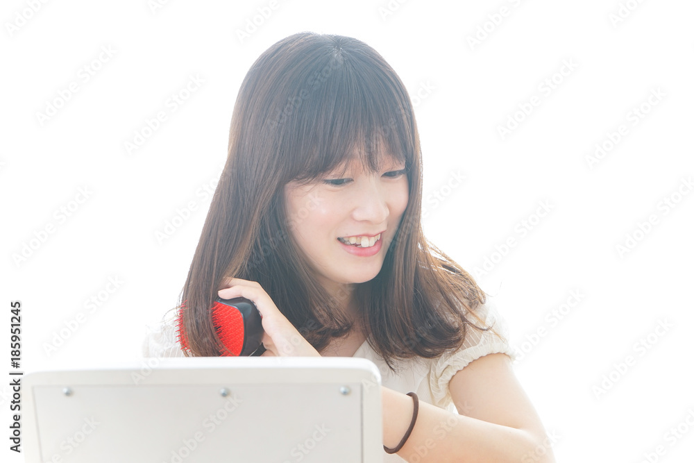 Naklejka premium Young woman taking care of face