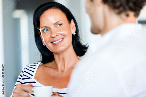 Woman having tea at home