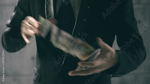 Close-up of Hands of illusionist performing card trick
