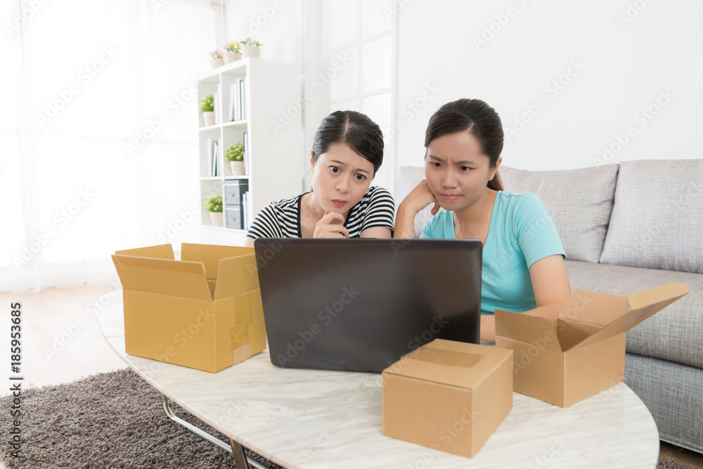 women shopper looking at online shopping website women shopper looking at online shopping website