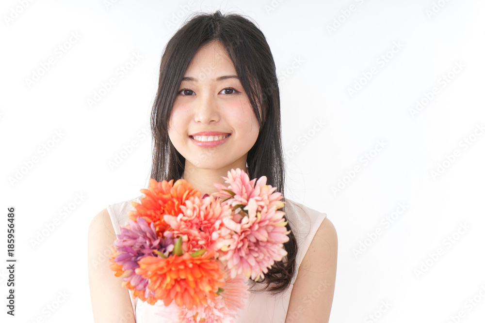 Young woman having flower bouquet