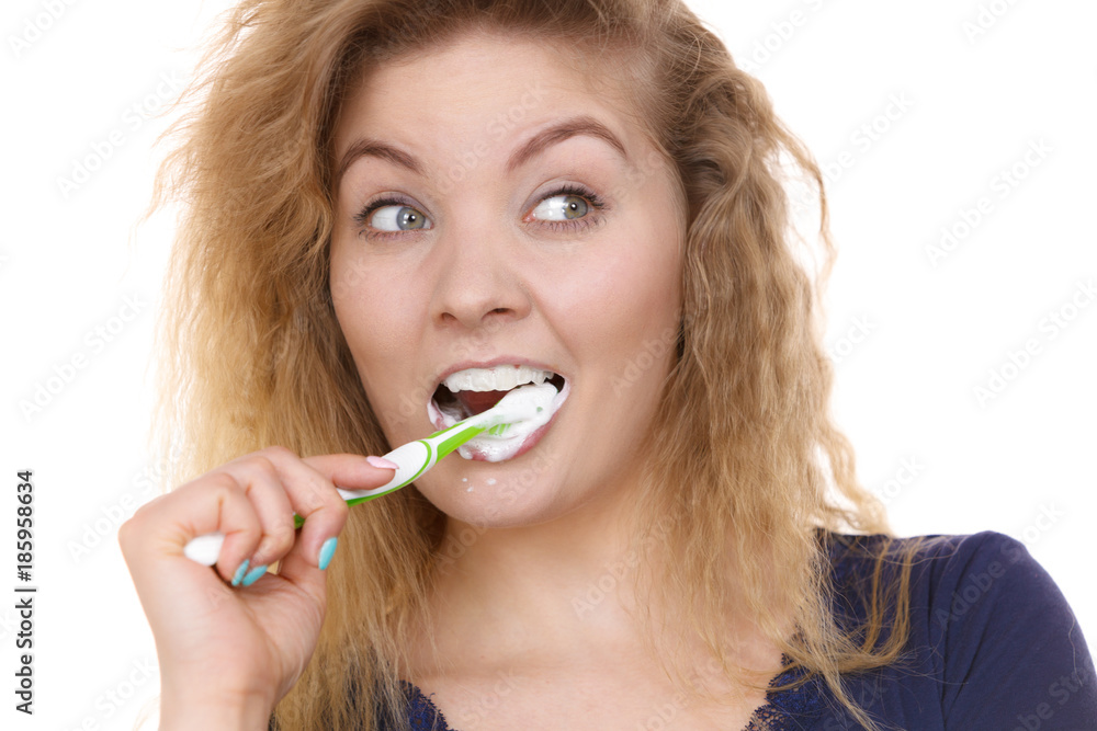 Woman brushing cleaning teeth Woman brushing cleaning teeth