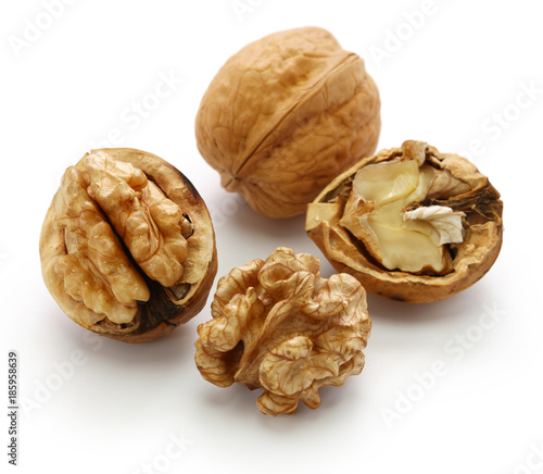 walnuts, kernel and shell isolated on white background