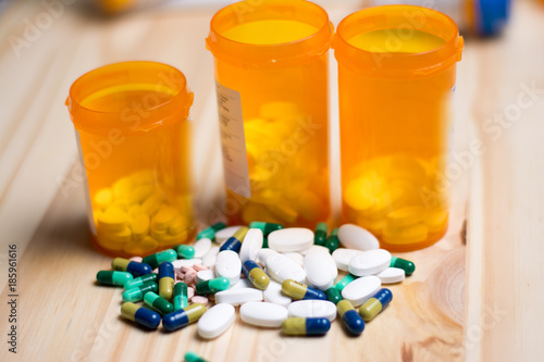 pills with bottles in the background photo