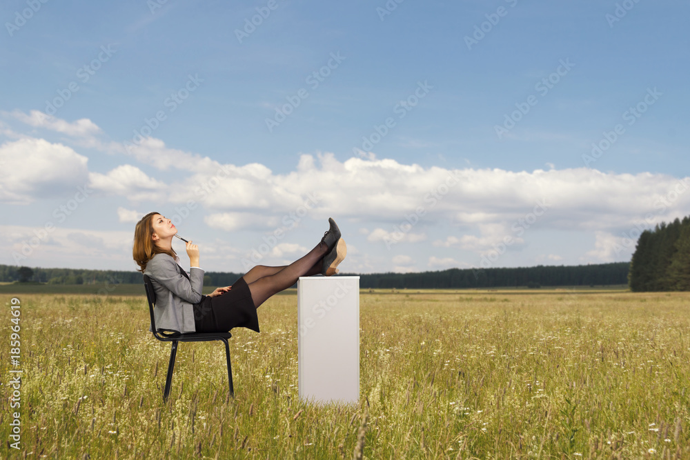 Business woman sitting dreaming in the box on the chair. Business woman sitting dreaming in the box on the chair.