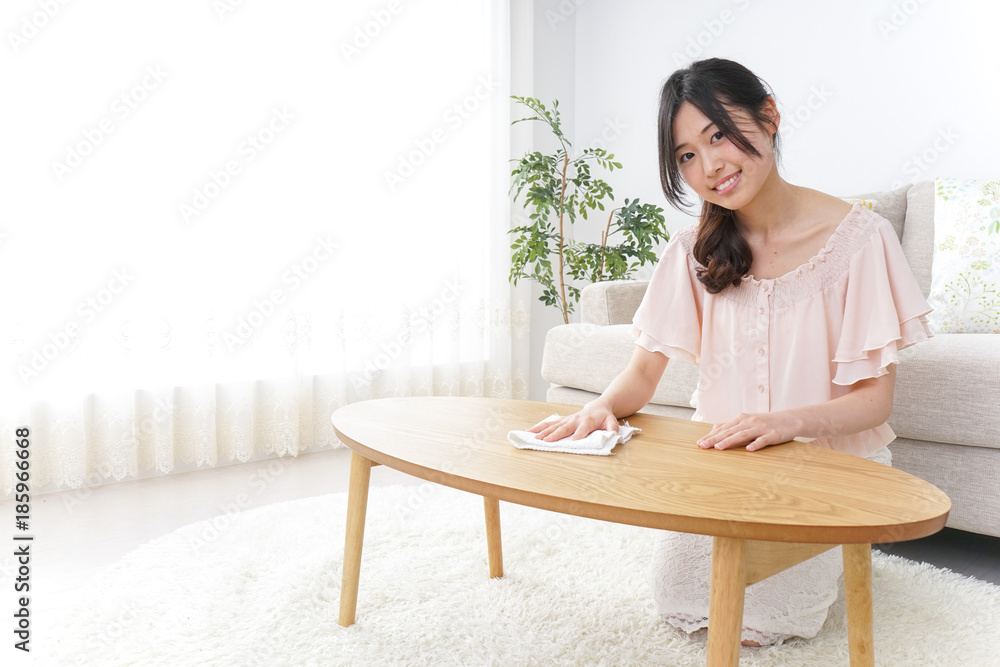 Young woman doing domestic duties Young woman doing domestic duties