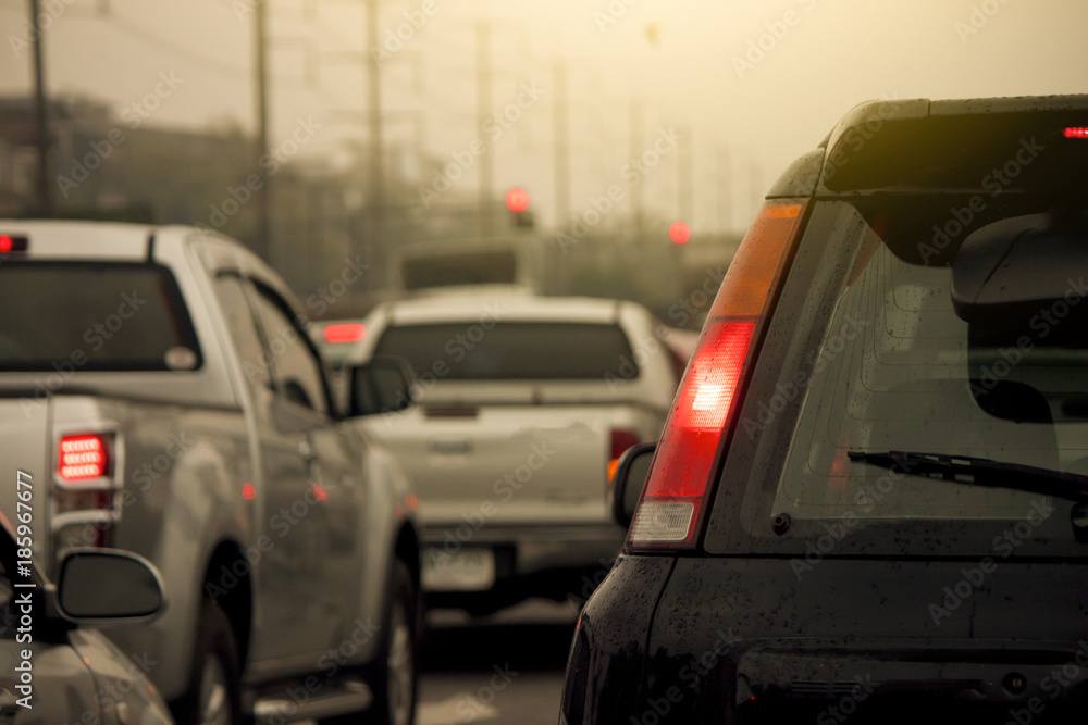 Cars jammed with traffic jams on rush hour in the morning with rain.