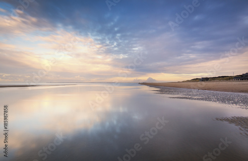 Clouds at Dutch beach with reflections © www.kiranphoto.nl