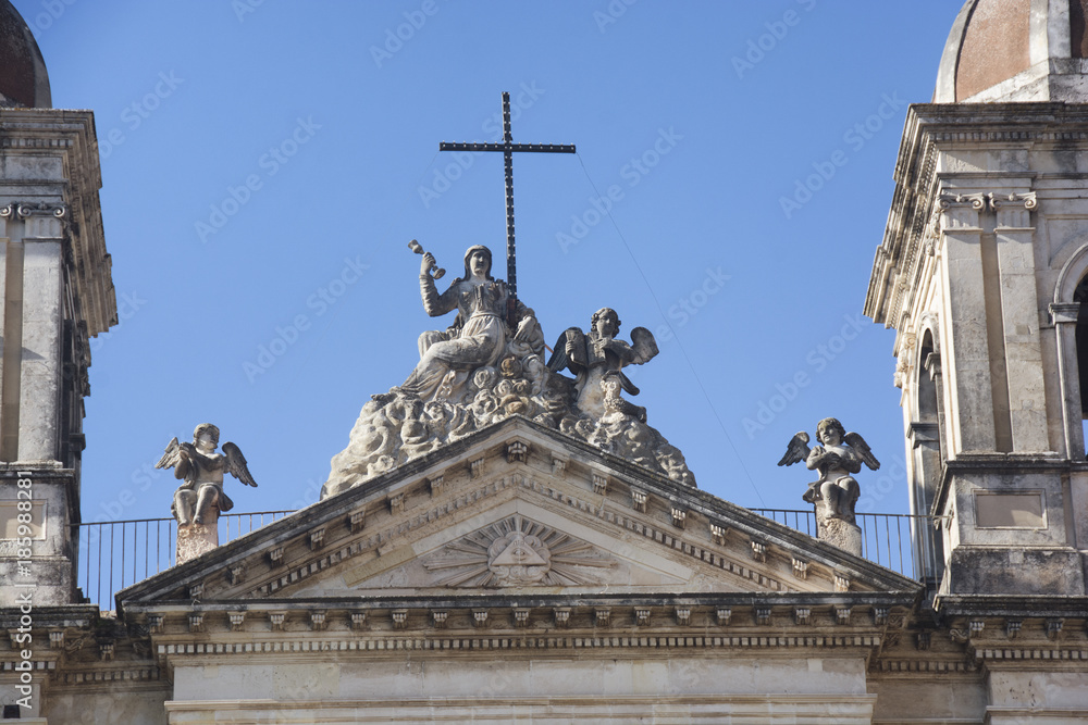 detail of statues and baroque columns of a church in Acireale in Sicily