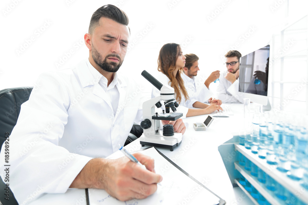 young scientist works in the lab. young scientist works in the lab.