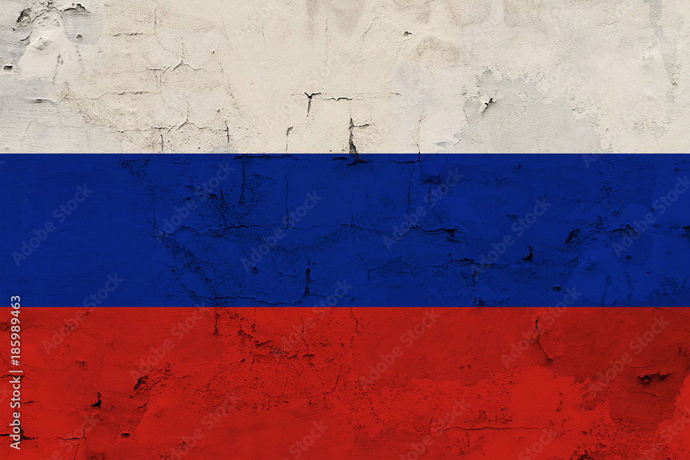 Russia and Soviet flag against the old wall background