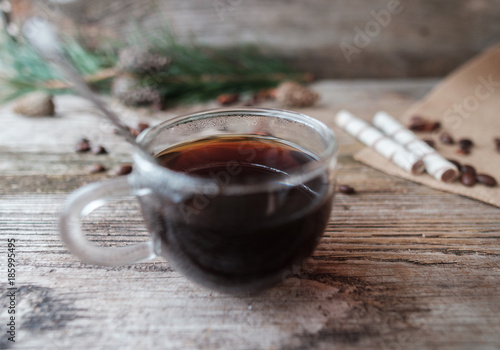 black coffee in glass Cup on wooden table