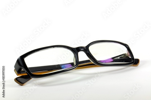 Black fashion reading glasses on white background.