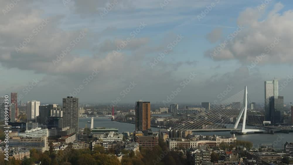 Cityscape view across rooftops, river and bridges, Rotterdam. Cityscape view across rooftops, river and bridges, Rotterdam.