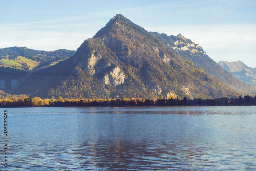 Beautiful view of mountain with lake Against blue sky