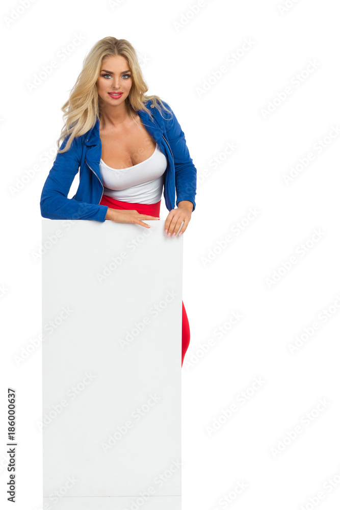 Sexy Blond Woman Is Standing Behind White Poster Sexy Blond Woman Is Standing Behind White Poster