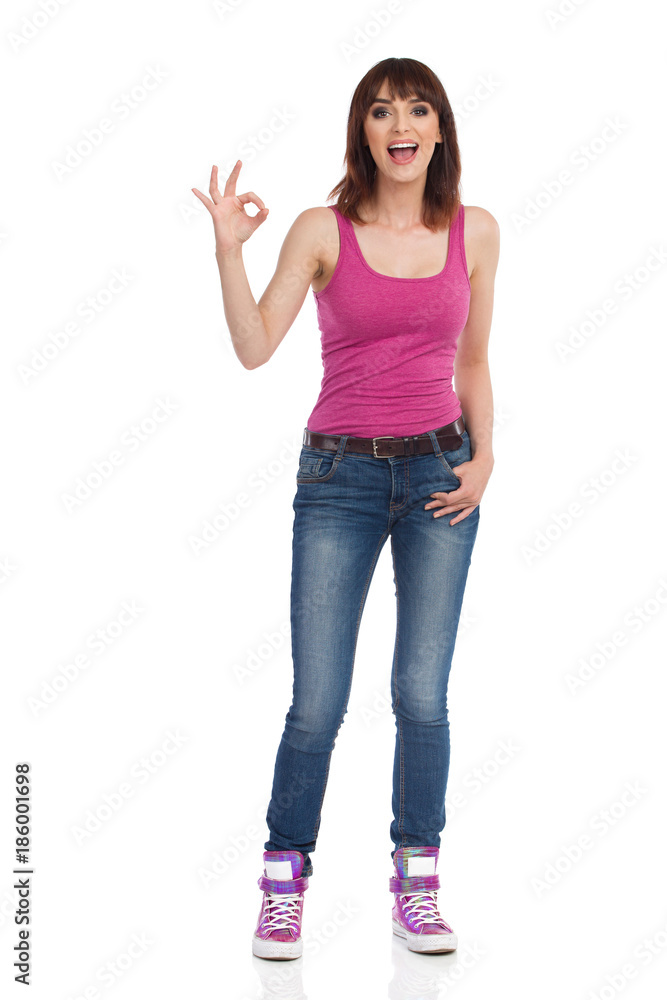 Excited Young Woman Is Talking And Showing Ok Hand Sing Excited Young Woman Is Talking And Showing Ok Hand Sing