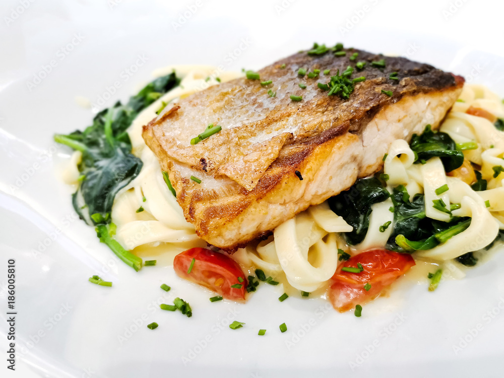 Grilled Salmon with fresh lettuce and mash potatoes Grilled Salmon with fresh lettuce and mash potatoes