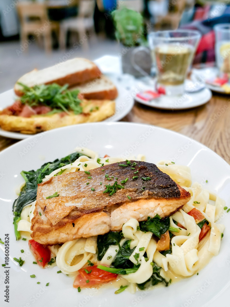Grilled Salmon with fresh lettuce and mash potatoes Grilled Salmon with fresh lettuce and mash potatoes