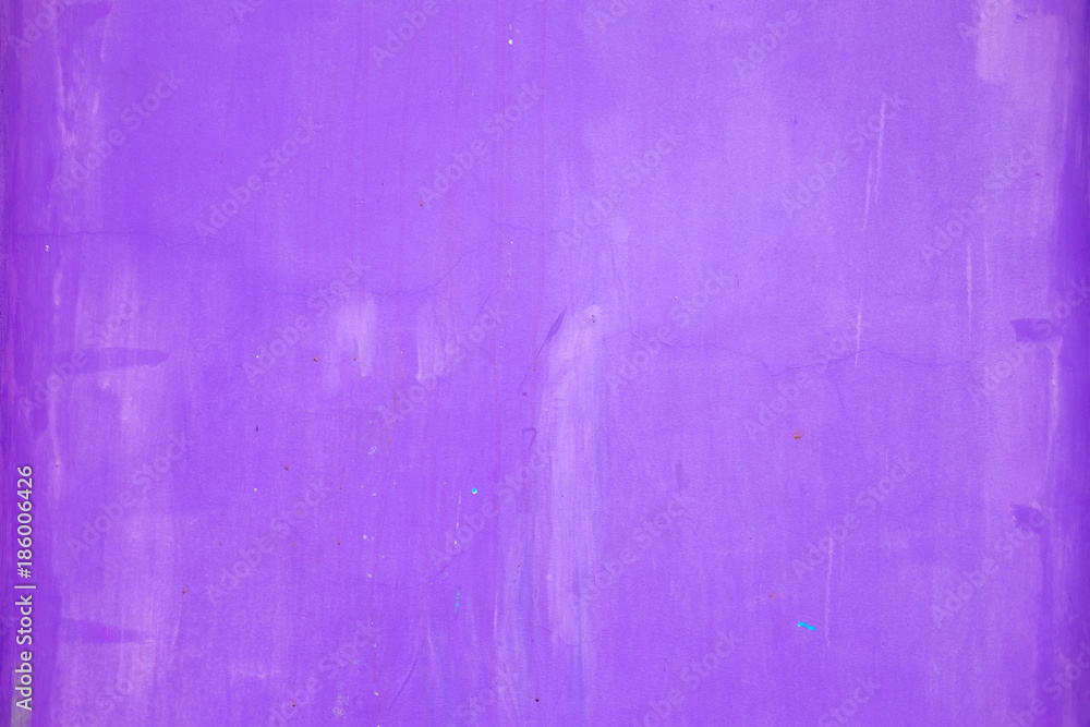 Fototapeta premium Purple painted stucco wall