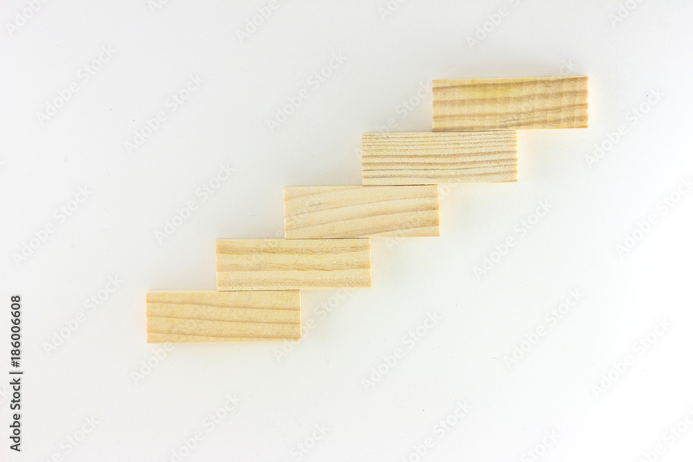 Arranging wood block stacking as step stair. Business concept for growth success process Arranging wood block stacking as step stair. Business concept for growth success process