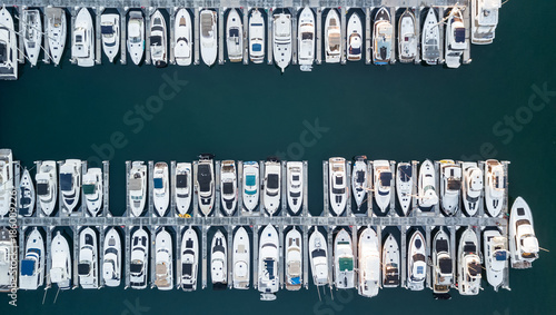 Drone view of a marina with boats and yachts