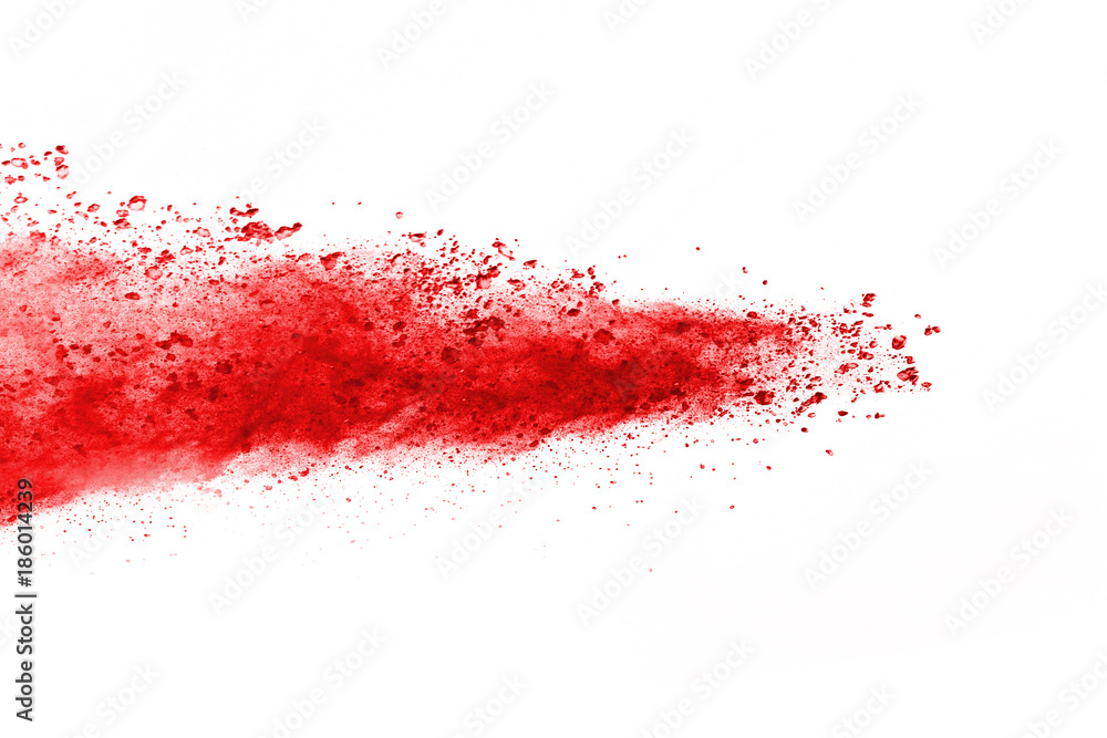 abstract powder splatted background. Red powder explosion on black background. Colored cloud. Colorful dust explode. Paint Holi.