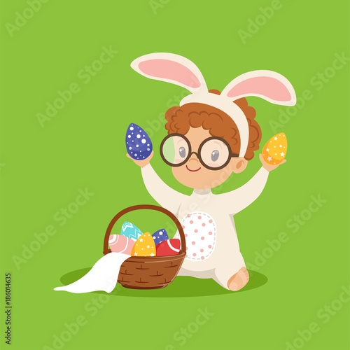 Cute little boy with bunny ears and rabbit costume playing with basket with painted eggs, kid having fun on Easter egg hunt vector Illustration