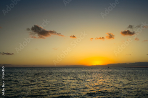 USA  Florida  Ocean from key biscayne at romantic orange sunset with boats and some clouds