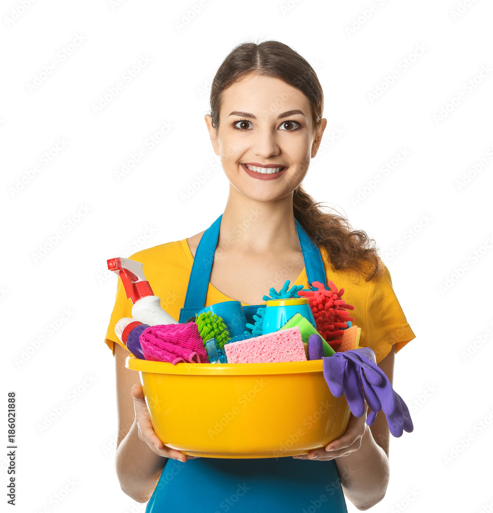 Woman with cleaning supplies on white background Woman with cleaning supplies on white background
