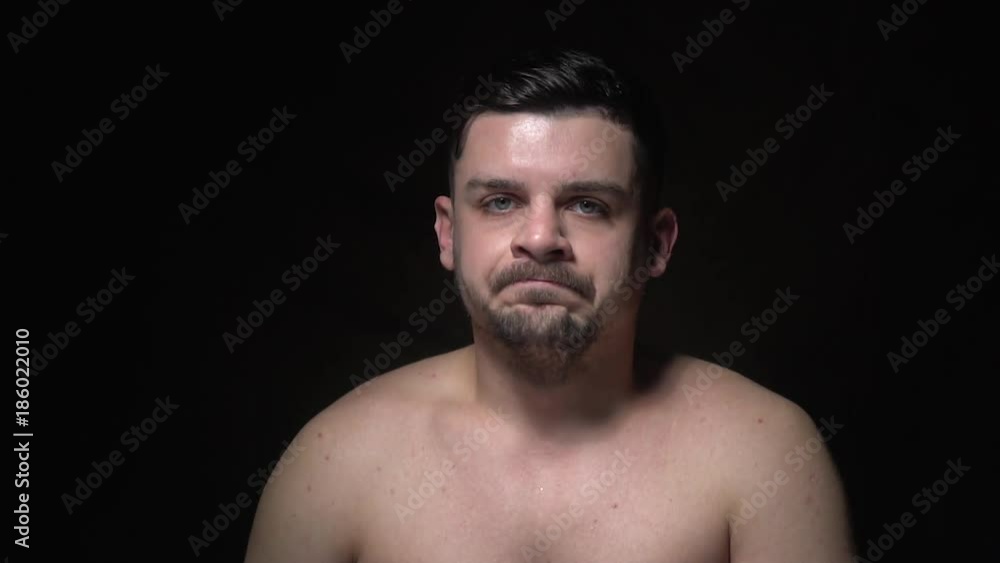 A man angry and looking at the camera A man angry and looking at the camera