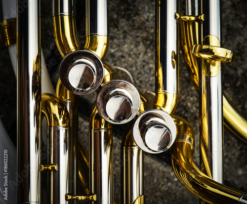 detail on the flaps of the brass sheet music instrument