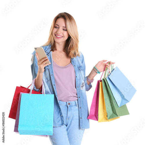 Happy young woman with shop...