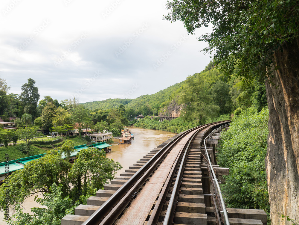 Landscape of Death Railway bridge over the Kwai Noi river at Tham Kasae station in Kanchanaburi - Thailand.