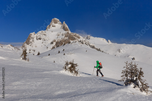 climbing on mountain in winter