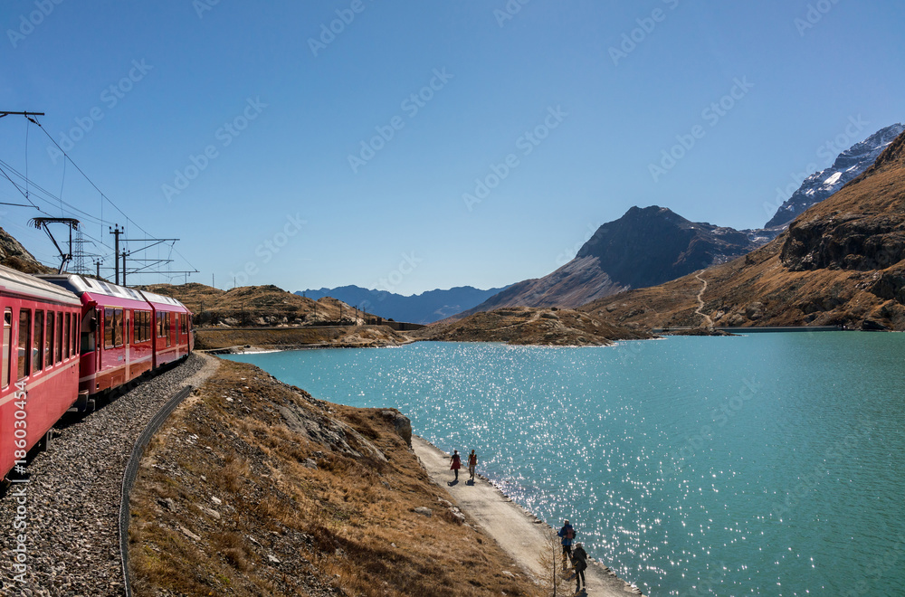 Obraz premium Red Swiss train from St. Moritz to Tirano.