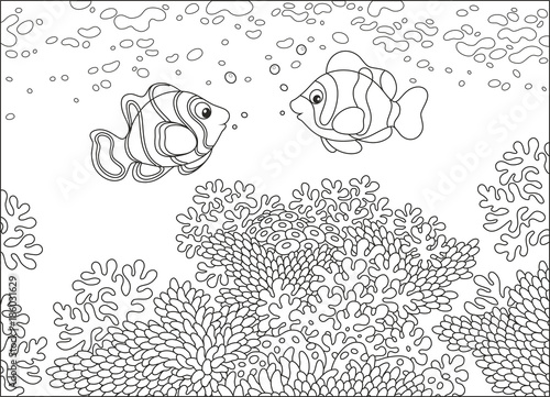 Black and white vector illustration of funny fishes swimming over a coral reef in a tropical sea