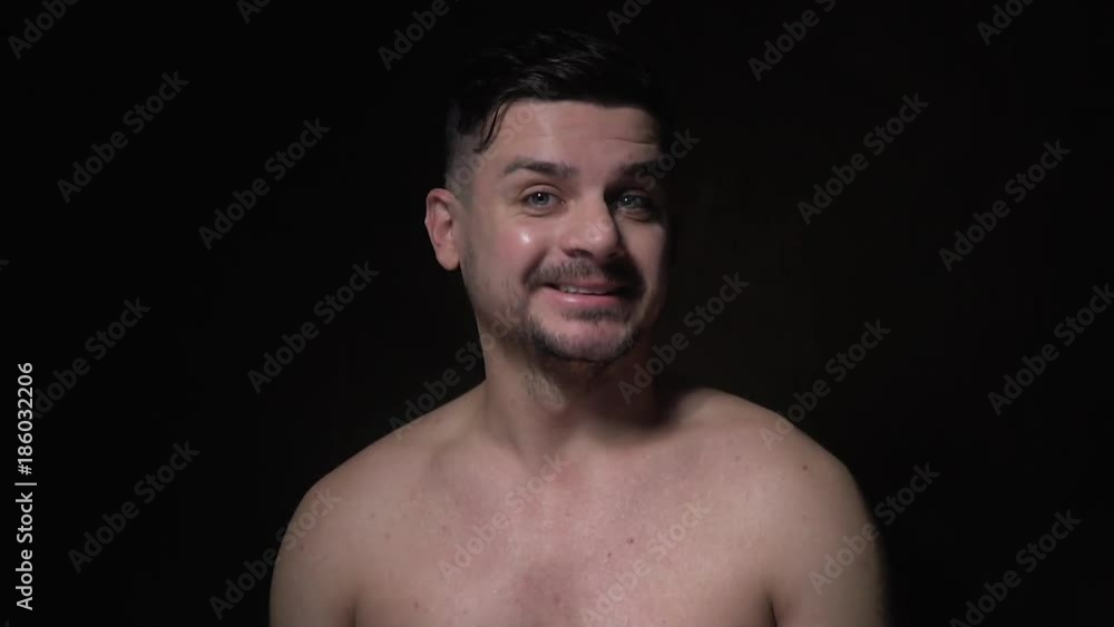 The bearded man is surprised and laughs The bearded man is surprised and laughs