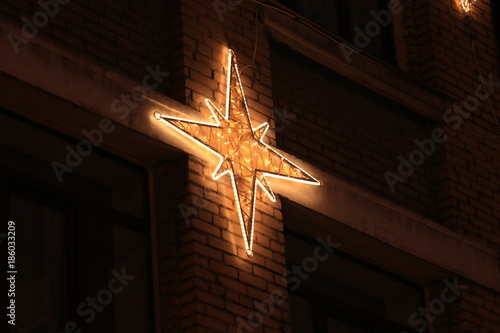 glowing snowflake on the facade