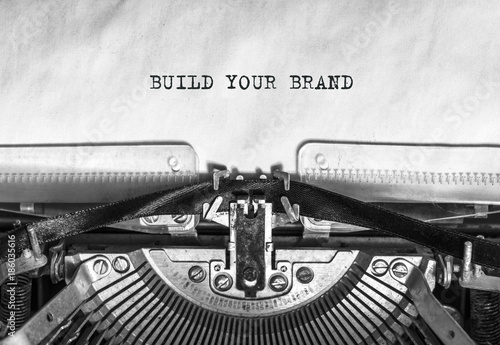BUILD YOUR BRAND typed words on a vintage typewriter